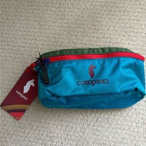 cotopaxi Teal Waist Pack with Red Zipper and Green Trim